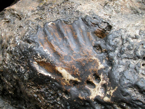 Padmasambhava handprint in stone.jpg