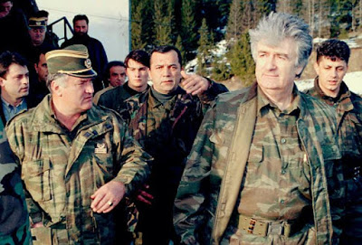 Bosnian Serb wartime leader, Radovan Karadzic (r.) and his general Ratko Mladic.jpg